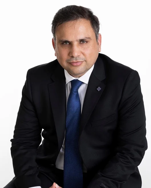 Portrait of Dr Charan J. Arora